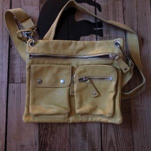 Fossil yellow leather crossbody bag.